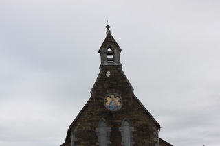 A church steeple in something fritter...