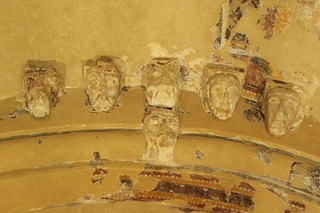 Heads and frescoe.