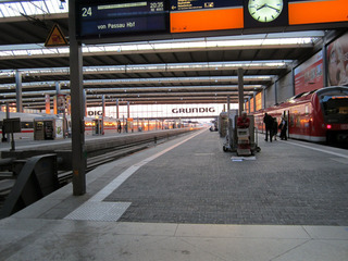 Munich train station at dusk.