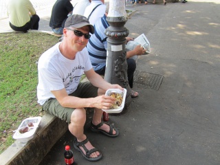 Picnicking on chicken. Not as good as what he is advertising