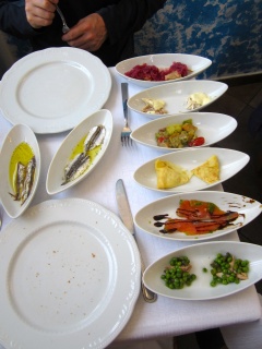 The first eight of twelve antipasto. One of the best things we've ever eaten
