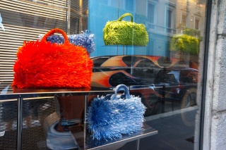 Shag purses in the Milan Fashion District. Brian is not sold