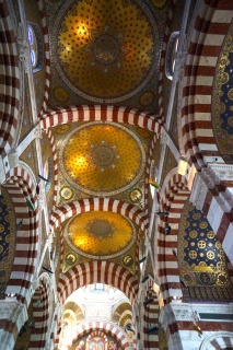 The striped red and white stone is a middle eastern architectural twist
