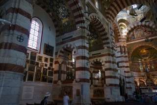 Interestingly decorated with lots of small paintings of boats and wrecked airplanes