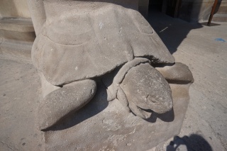 The tortoise at the base of the inland column. The seaside column had a sea turtle