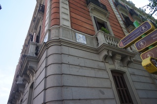 The street signs are all tile work in downtown Madrid