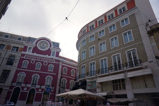 The building on the right is literally wrapped in tile