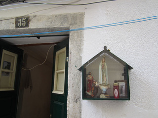 We are not sure what these outdoor wall dioramas are called, but we like them