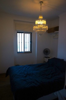 Goodbye to our fairly plain room with a chandelier