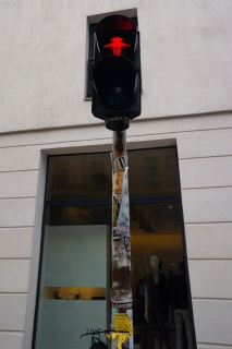 East German Ampelmann saying stop. Read the Wikipedia article, it's pretty interesting