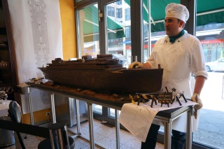 At Fassbender & Rausch Chocolatiers (formerly "royal"), the man is carving the Titanic in chocolate