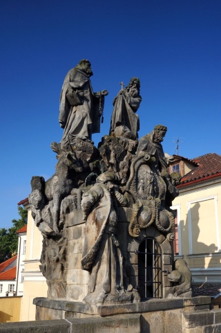 The sun makes the statuary look a little less black