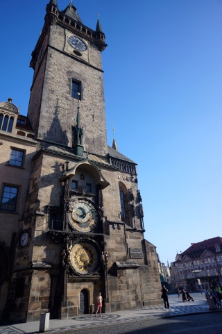 The clock tower in the Old Town Square and a girl we don't know