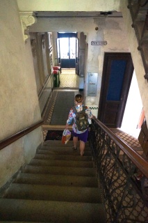 Theresa, heading out with a little recycling. Big receptacles on the corner