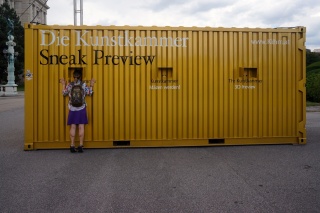 Theresa peering at a preview