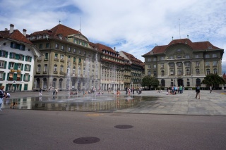 An awesome fountain that operates like that random setting on Christmas lights. A Swiss Bank in the background