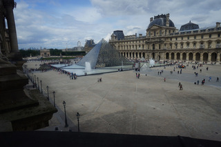 Looking back out a window at the Louvre courtyard