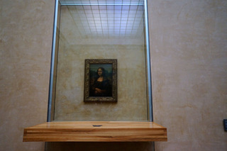Big Deal, you know this one. Leonardo da Vinci's Mona Lisa. Well protected...