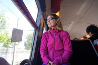Happy to be touristing, on the train to Versailles