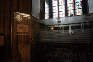 A surprisingly modern looking confessional. You sit at a desk