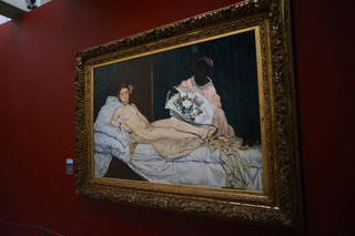 Big deal. Edouard Manet, Olympia. Also where Theresa learned the photo policy