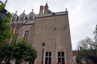 If guide books are to be believed, the smallest gothic window in Europe midway down on the right