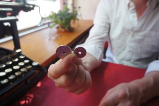 Danish money has holes, which makes it easier to wear