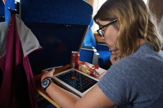 Theresa, determined to beat the iPad. She did