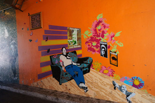 Wall mural on the way into a courtyard restaurant we couldn't begin to afford