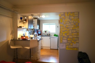 Our kitchen, with post it notes from visitors