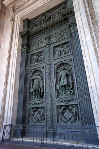 Cast doors, huge and expressive