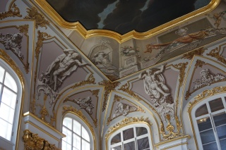 You can do a lot with rounded corners, paint and a little perspective