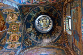 Each of the onion domes has a portrait underneath it