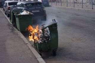 A burning trash bin, we are guessing from a tossed cigarette