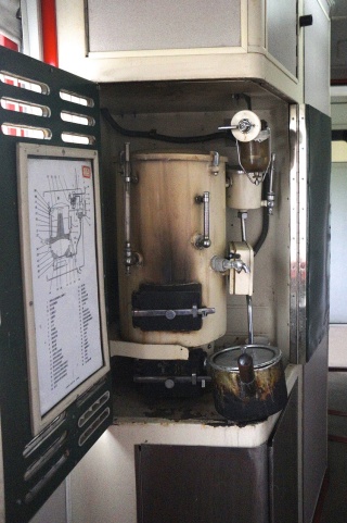A samovar. Every car has one. Boiling hot water, heated by coal. Brilliant
