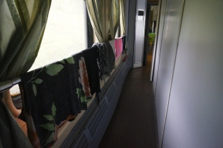Drying clothes in the hall outside the dining car