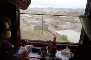 Theresa, sipping soda and watching the world go by