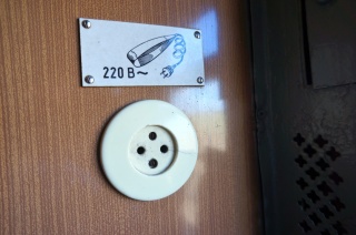 A little inconveniently located in the hallway without a mirror
