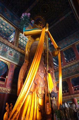 ...housing an 80 foot Buddha, carved from a single piece of sandalwood