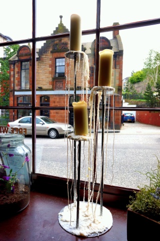 Candles with strings, looks a little Pinterest