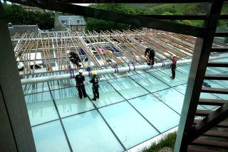 A crew who appeared to be painting the copper pipes