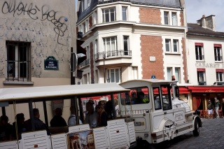 The little white train that trucks tourists up the hill