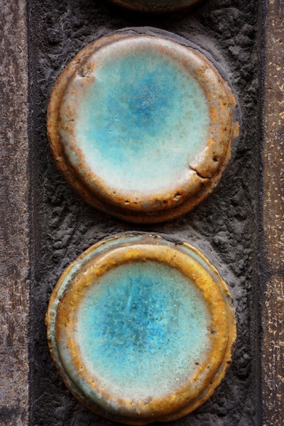 Decorated with sandstone ceramic medallions