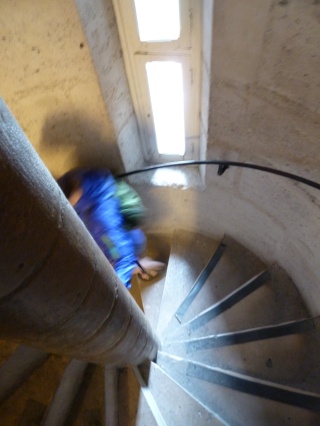 Theresa descending our favorite type of staircase