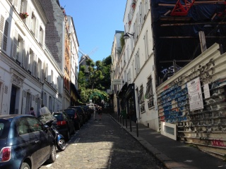 Windmill at the top of a street, a moulin it turns out