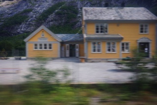 Our home as the train sped by it
