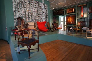 In a contemporary design room, chairs. Brian loves chairs