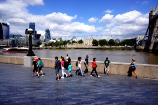 Queen's Walk along the Thames — Tower of London across the water