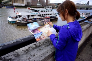 Theresa plots the Thames with a tourist map