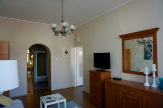 Our spacious living room, spacious bedroom through the door